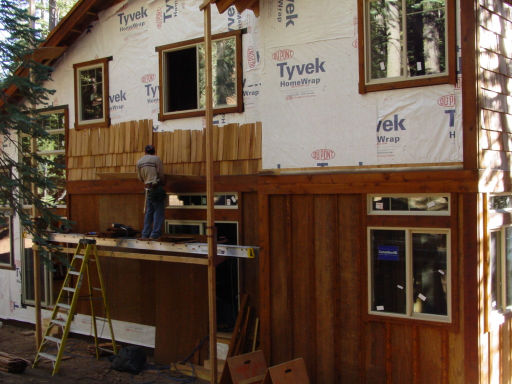 Carpenter Applying Shingles