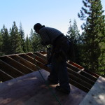 Carpenter Nailing Roof Sheating